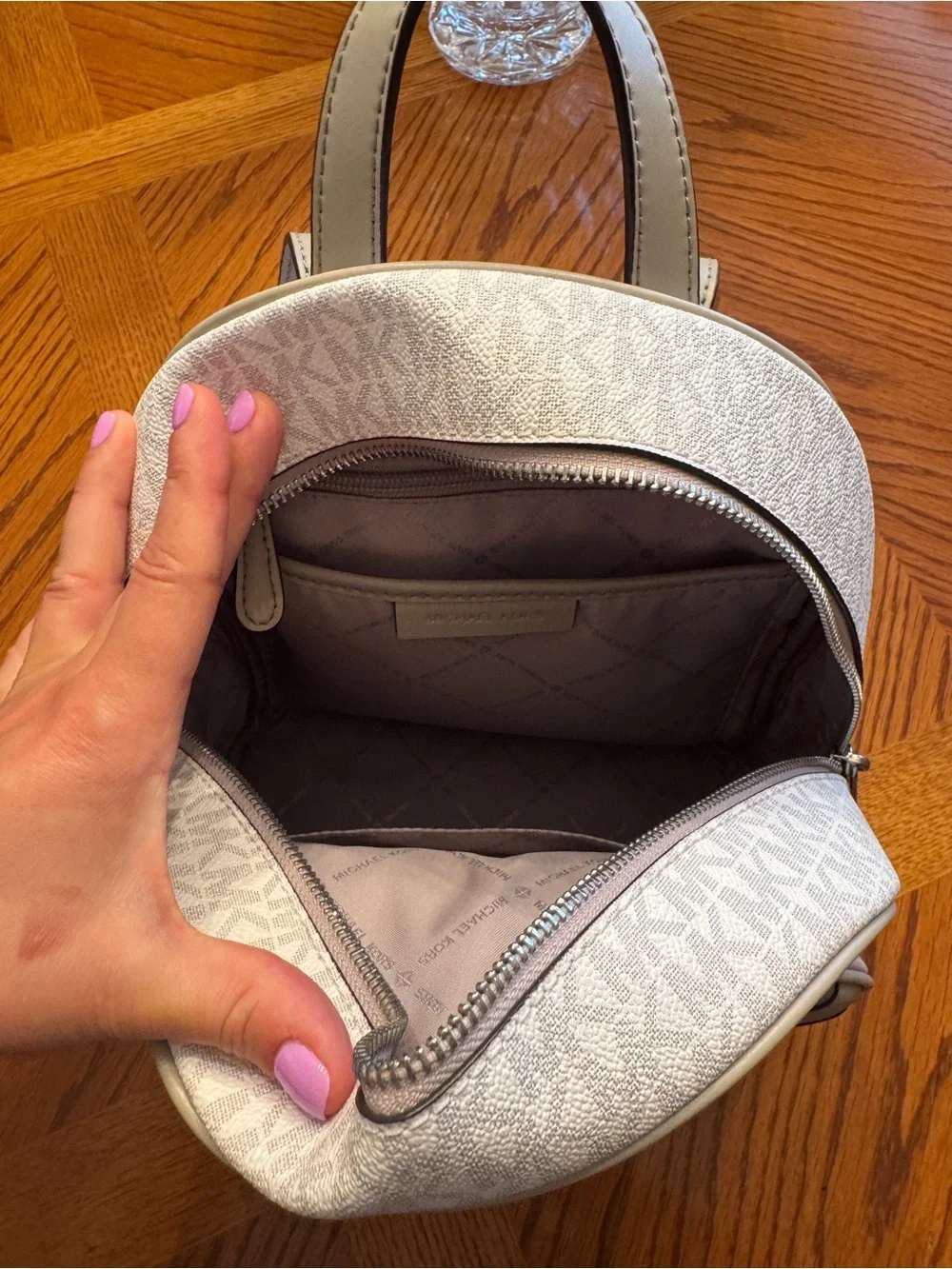 Michael Kors Chevron Accent Mini Backpack in white and gray